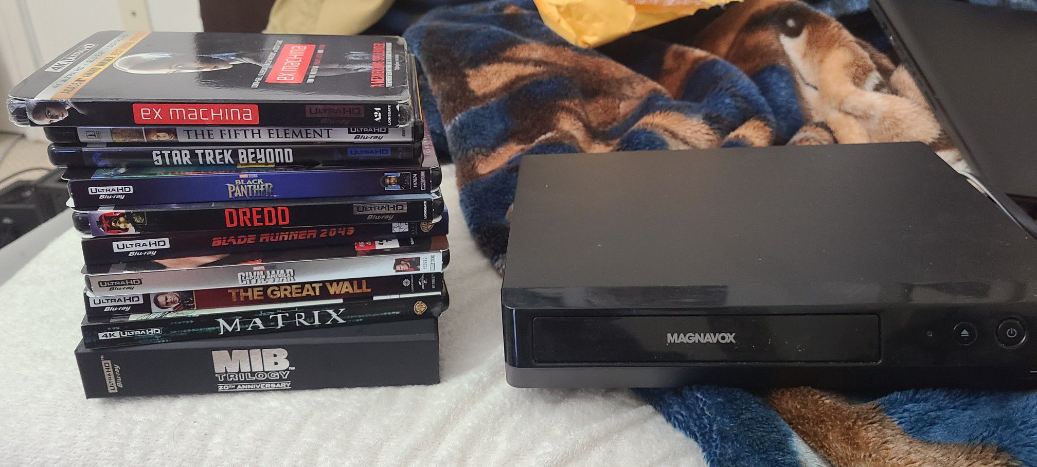 Magnavox 4k player and movie lot