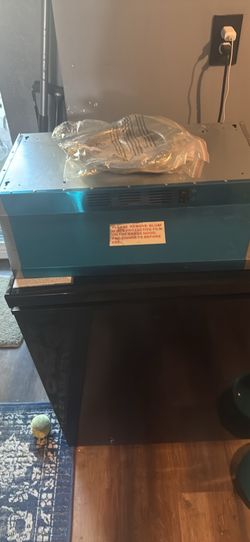 Brand new exhaust fan & lightly used microwave
