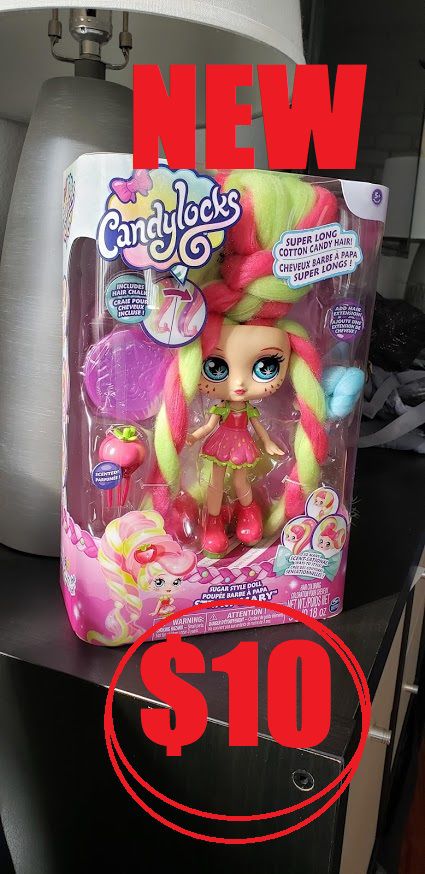 New Candylocks Barbie Doll with Dreads hair. Smells like strawberries and has 12 inches of super soft cotton candy hair. Brand new