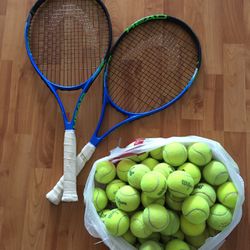 2 Tennis Rackets And 50 Balls