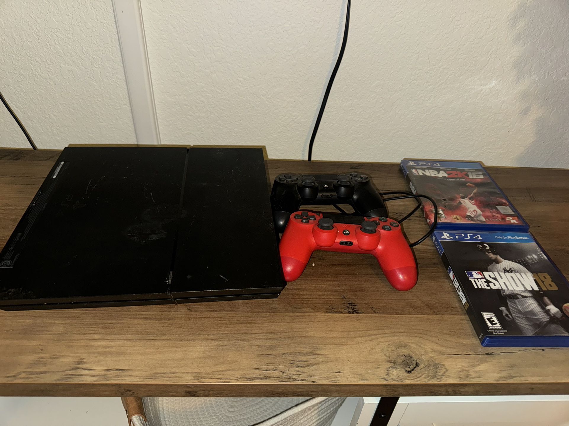PS4 with 2 Controllers & 2 Games 