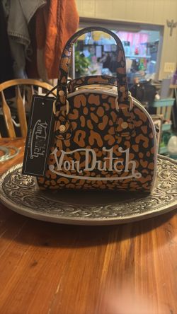 VON DUTCH ORANGE CHEETAH BOWLING BAG