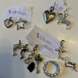 Sterling silver or 10 K white gold pendants