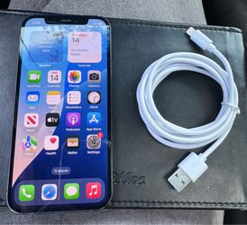 iPhone 12 64gb unlocked for any service it’s a 8.5 out of 10 works perfect with charger 90 day warranty can deliver