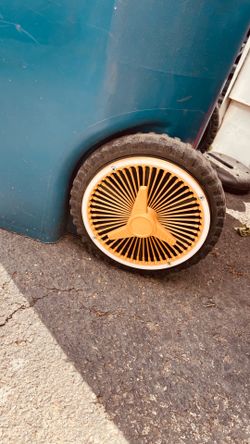 Garbage can spoke hubcaps