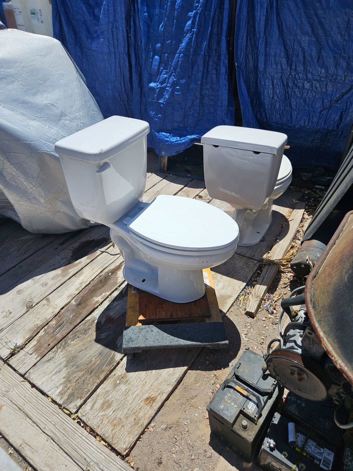 2 toilets need gone