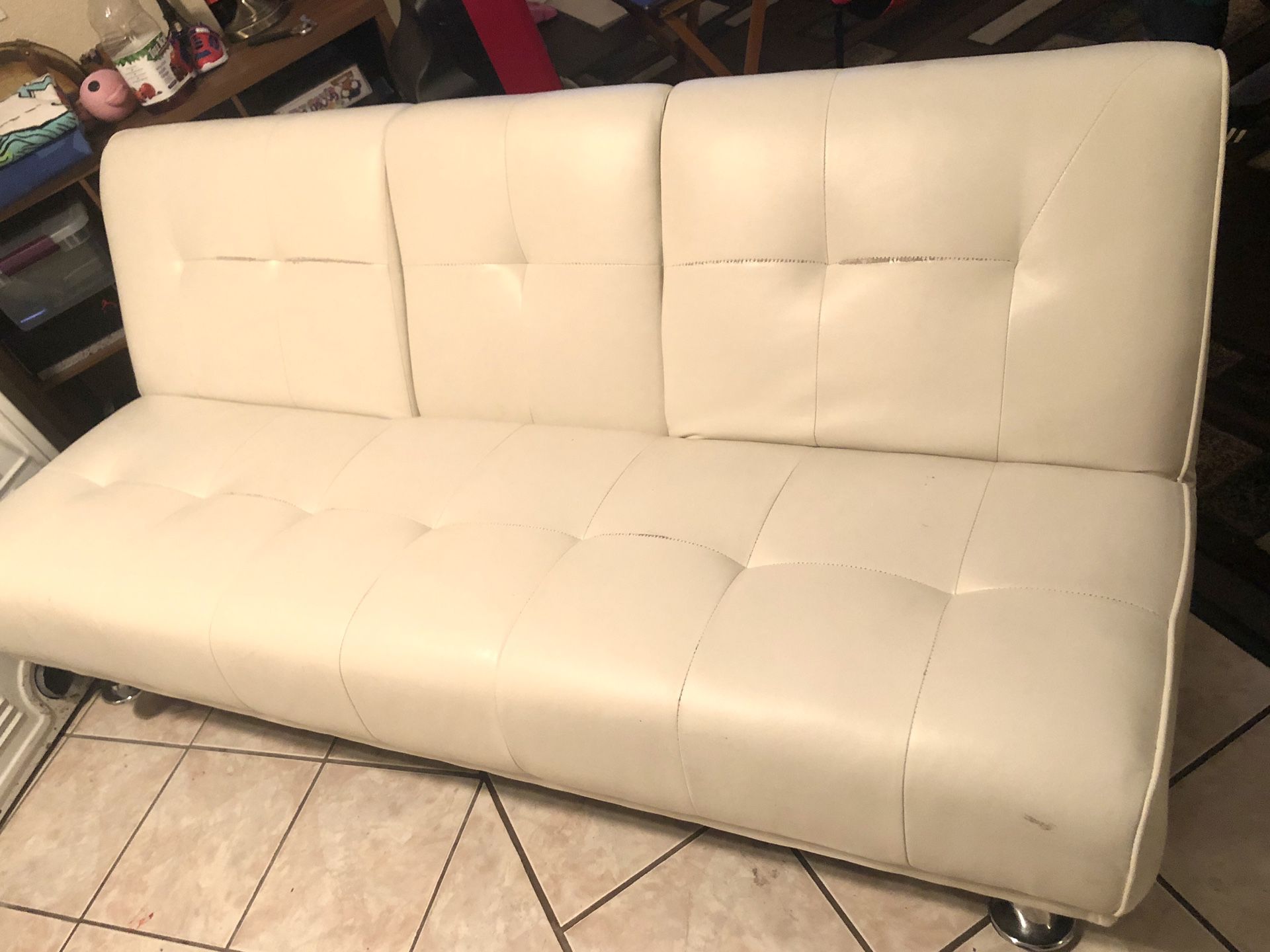 White leather futon couch