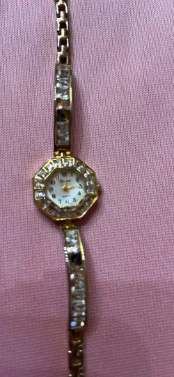 Women’s Geneva Watch Missing 2 Gem