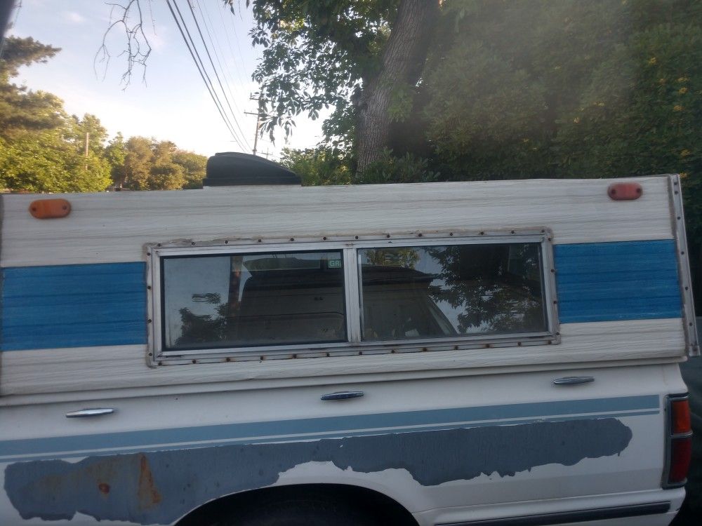 Vintage old school small truck camper shell