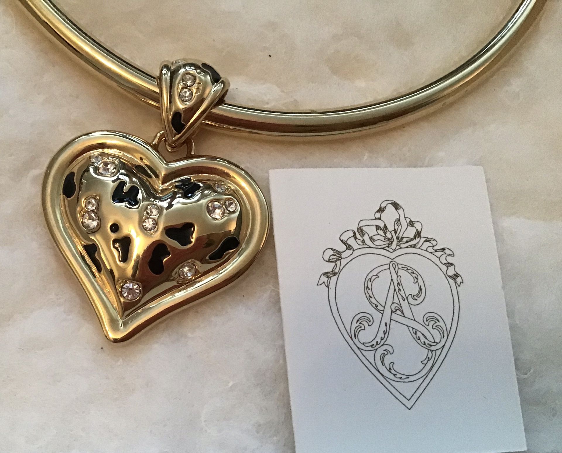Gorgeous necklace. Double sided heart. This would make a lovely gift. Brand new. Never worn