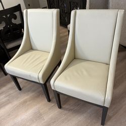 2 Beige Leather Chairs 