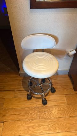 Mini white rolling chair