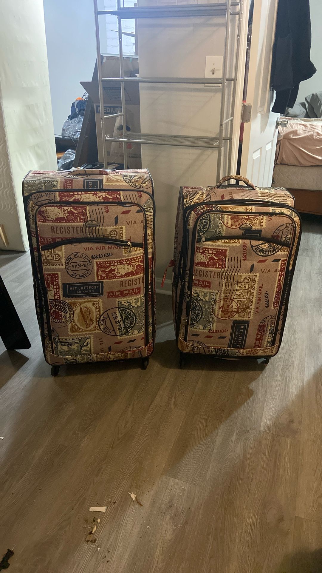 2 postal stamp, luggage bags, large and medium