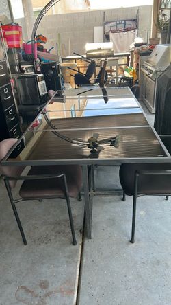 Patio table glass and metal with 6 chairs