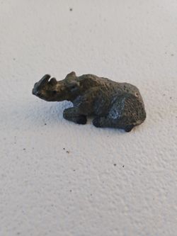 Tiny Rhinoceros Figurine