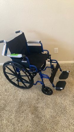 Wheelchair New With Footrests