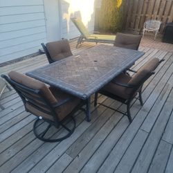 Large Rectangle Heavy Stone Patio Table With 2 Swivel And  2 Standard Chairs And 8 Cushions With Storage Box