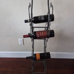 Dark gray wrought iron 12 Bottle wine rack