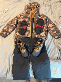 Snow suit, water resistant jacket, snow gloves and snow shoes.