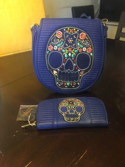 Loungefly skull bag and wallet