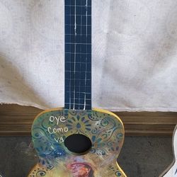 SANTANA WOOD GUITAR CUTOUT 32X12X3/8"