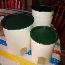 4- Piece Tupperware Canisters With Lids, Missing 1lid Slightly Used, $30.  Must Pick Up In Oak Cliff