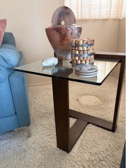 Glass top coffee table with side table
