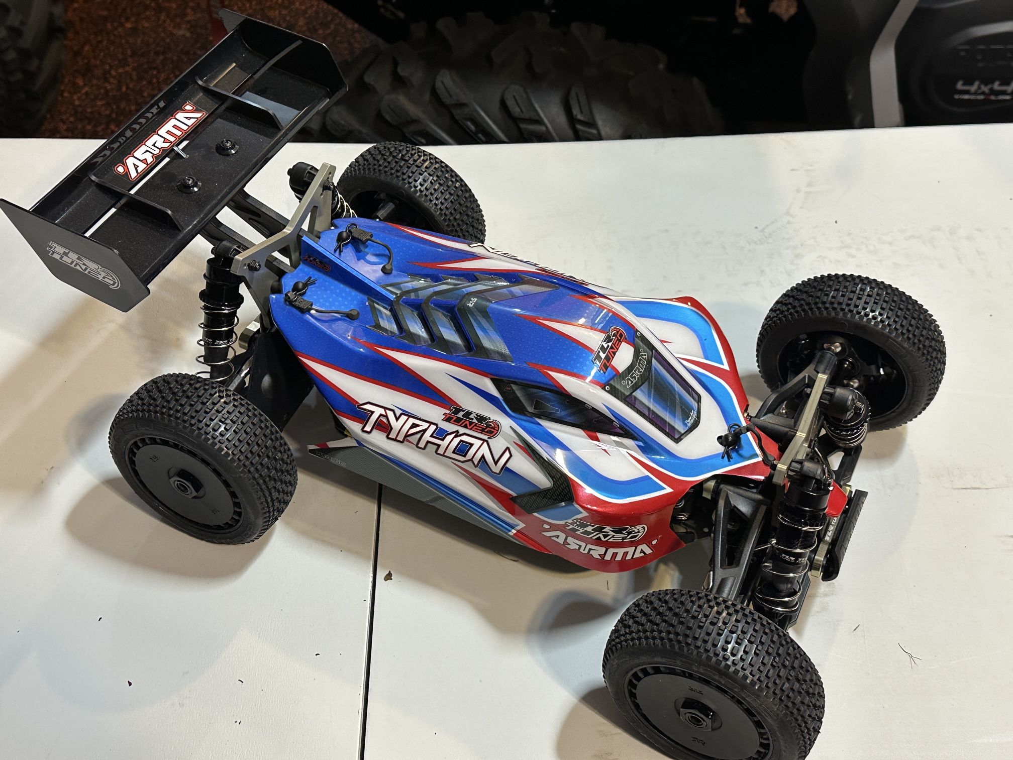 Brand new (no box) Arrma Typhon 6S "TLR Tuned" 1/8 4WD RTR Buggy (Red/Blue)