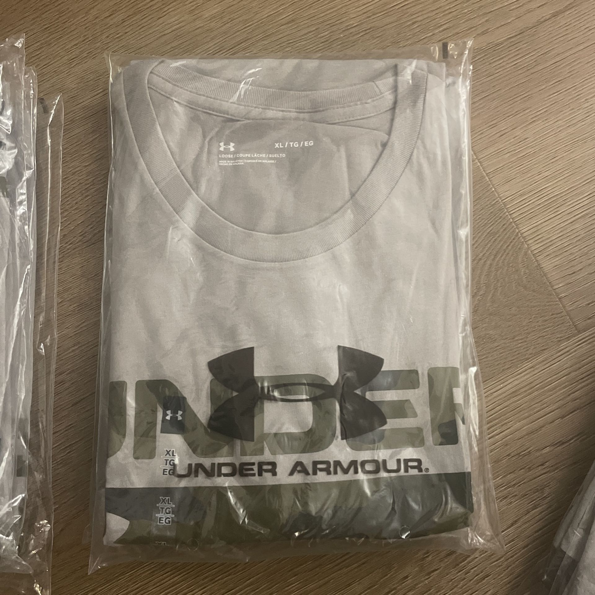 Brand New Under Armour Size XL Shirt. Color Grey American Camo