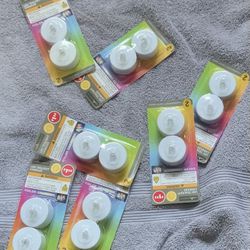 Brand New Rainbow Colored T Light Candles. Fire Free