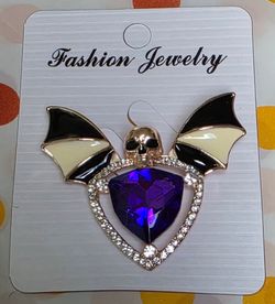 SKULL Bat Wings with Purple Stone Brooch