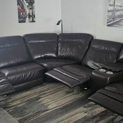 Brown reclining leather sofa”