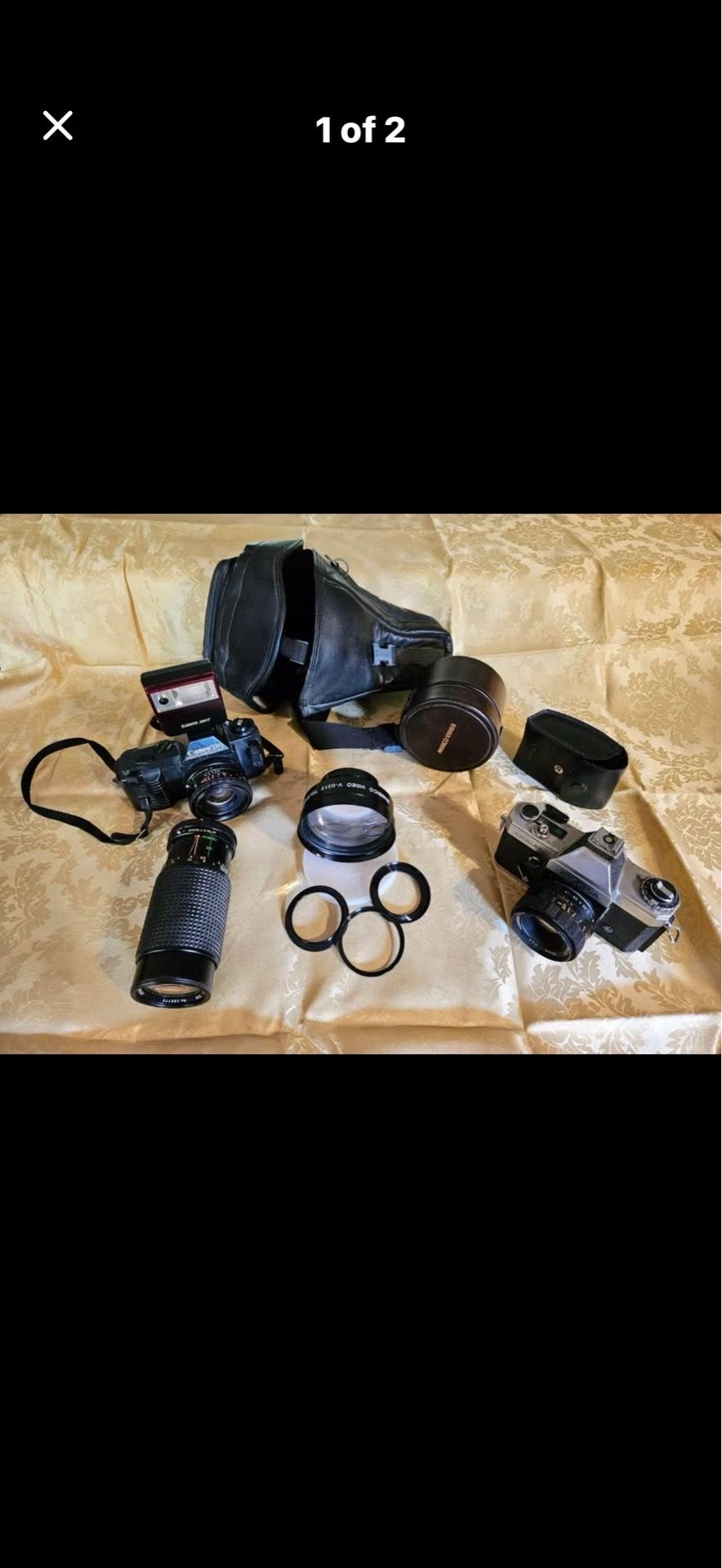 Canon and Yashica cameras with some equipment
