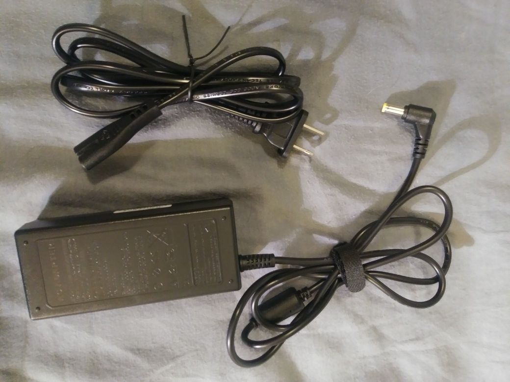 Brand new computer a.c. adaptor and charger cords
