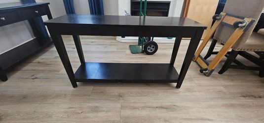 Couch table dk wood.