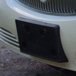 Vanity Plate Bracket off a 2009 Buick Lucerne. 