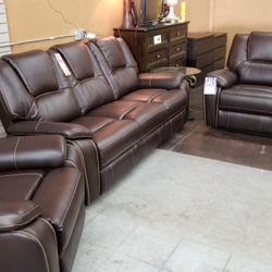 Dark brown power reclining sofa love and chair