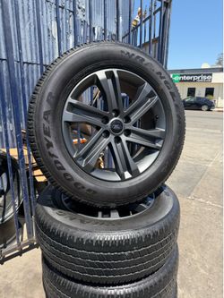 SET OF FOUR 20” FORD SPORT WHEELS AND TIRES