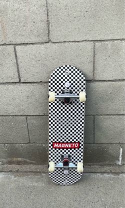 Magneto Checkered Skateboard with Black Griptape