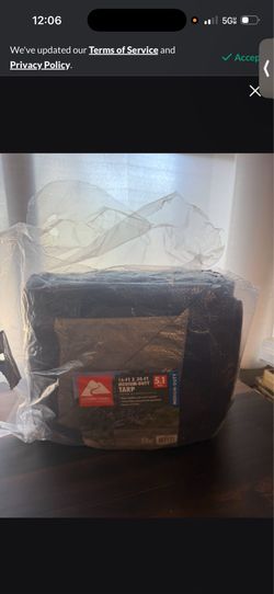 A rolled-up blue tarp