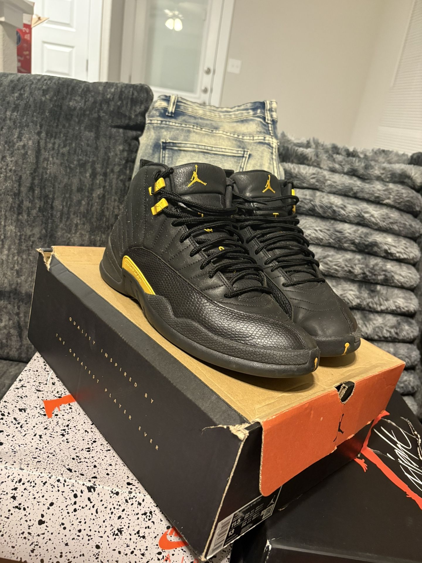 jordan 12 black taxi