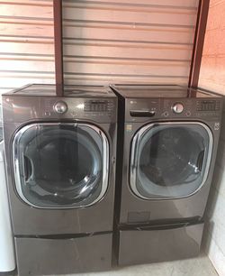 LG Washer And Electric Dryer Matching Set With Pedestals