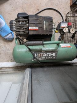 Hitachi EC12 twin-stack portable air compressor