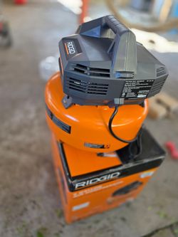RIDGID 6 Gal. 150 PSI Portable Electric Oil-Free Jobsite Pancake Air Compressor with Dual Pressure Gauges and 2-Quick Couplers