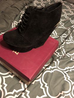 Black wedge booties