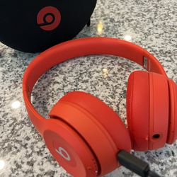 Beats Solo3 over ear product red headphones