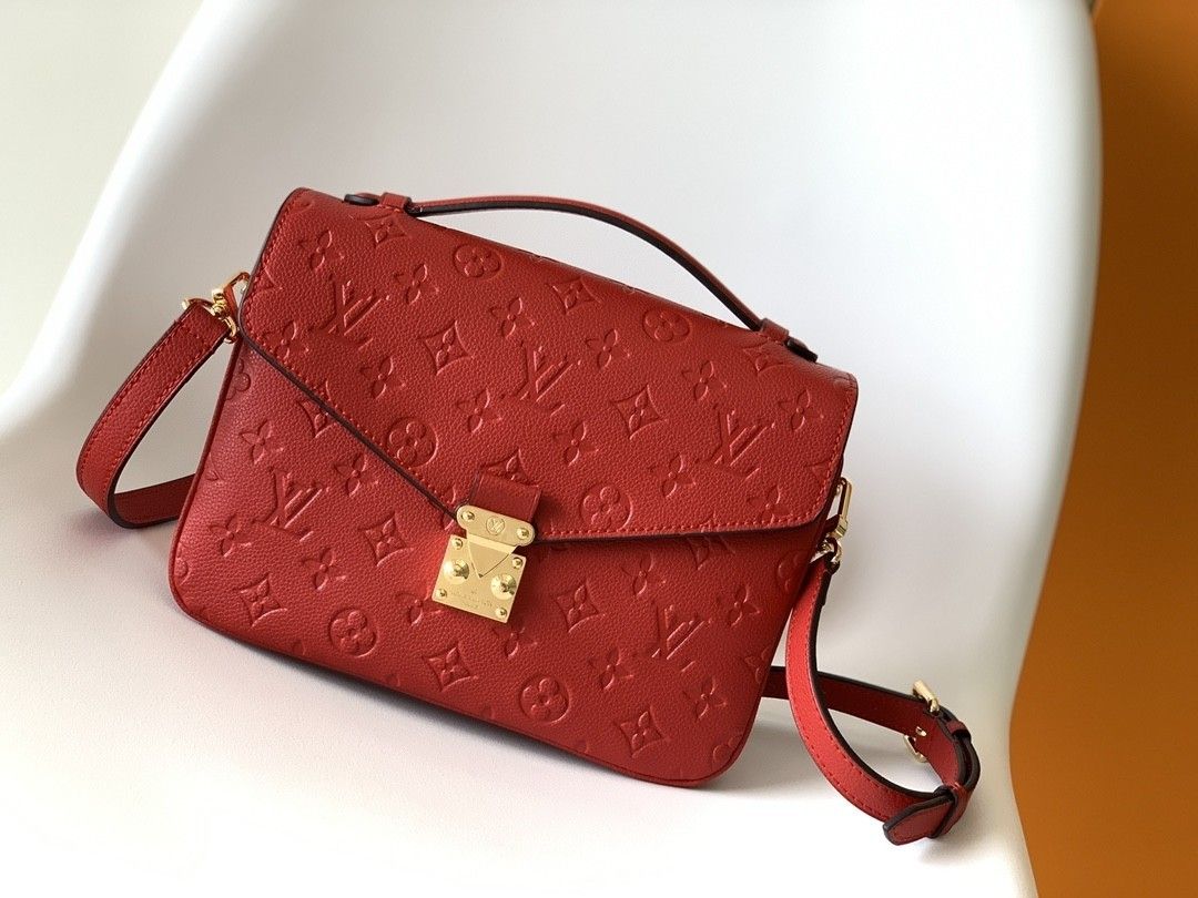 Pochette Métis Leather Messenger Bag in Red with Lock Closure