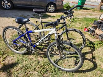 Lot of 2 Premium Mountain Bikes Kona Lanai M and Giant AT 740 L /XL "Both are in good Condition "
