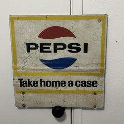 Vintage Pepsi "Take Home A Case" double-sided metal advertising sign measuring approximately 17" x 16". Original store advertising piece