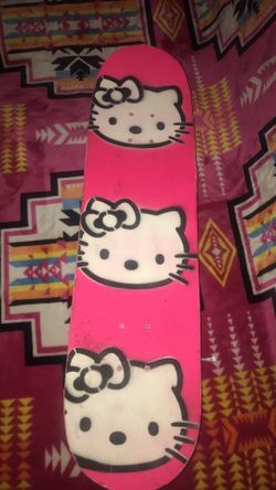 Skateboard with hello kitty grip tape